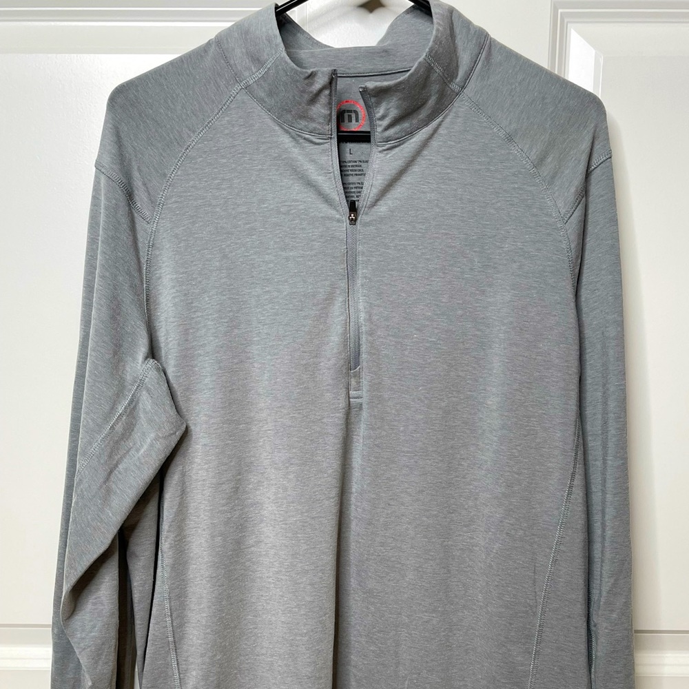 Travis Mathew quarter zip pullover.